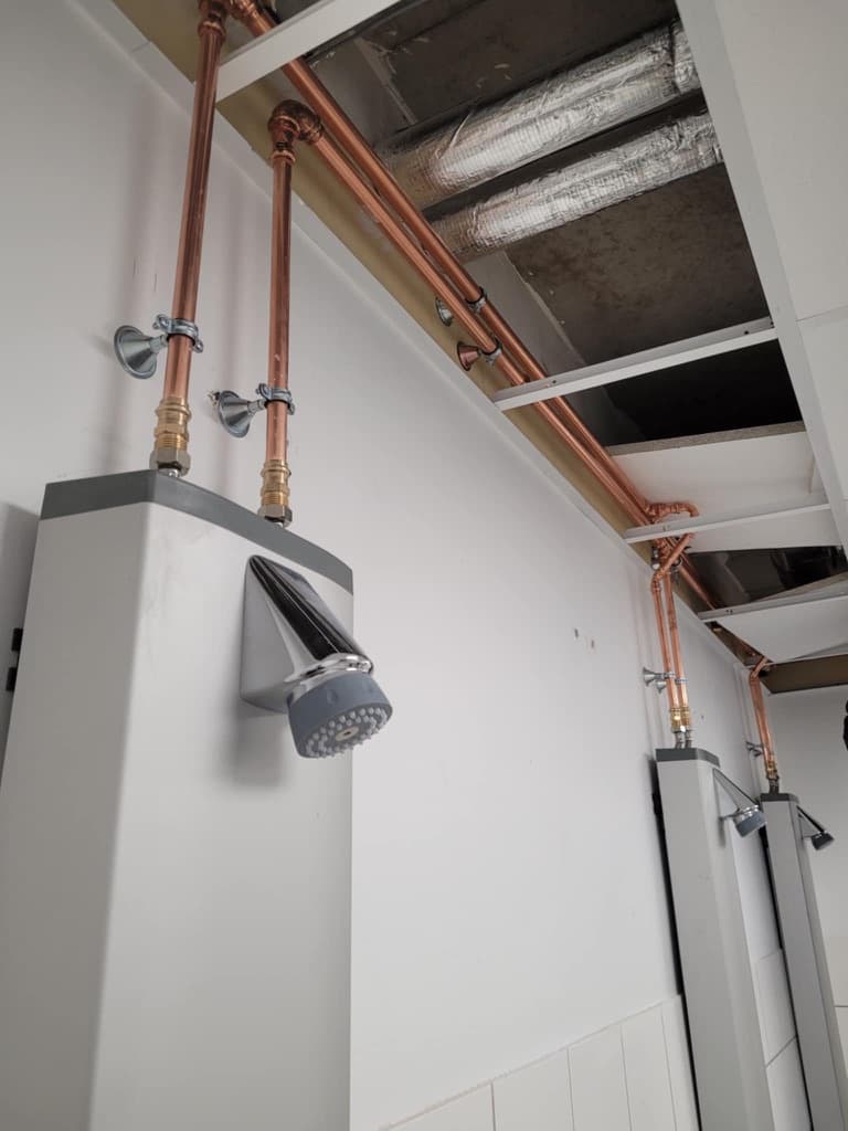 Réfection de conduites dans une école de formation